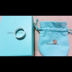 Tiffany and Company ring and heart pendant